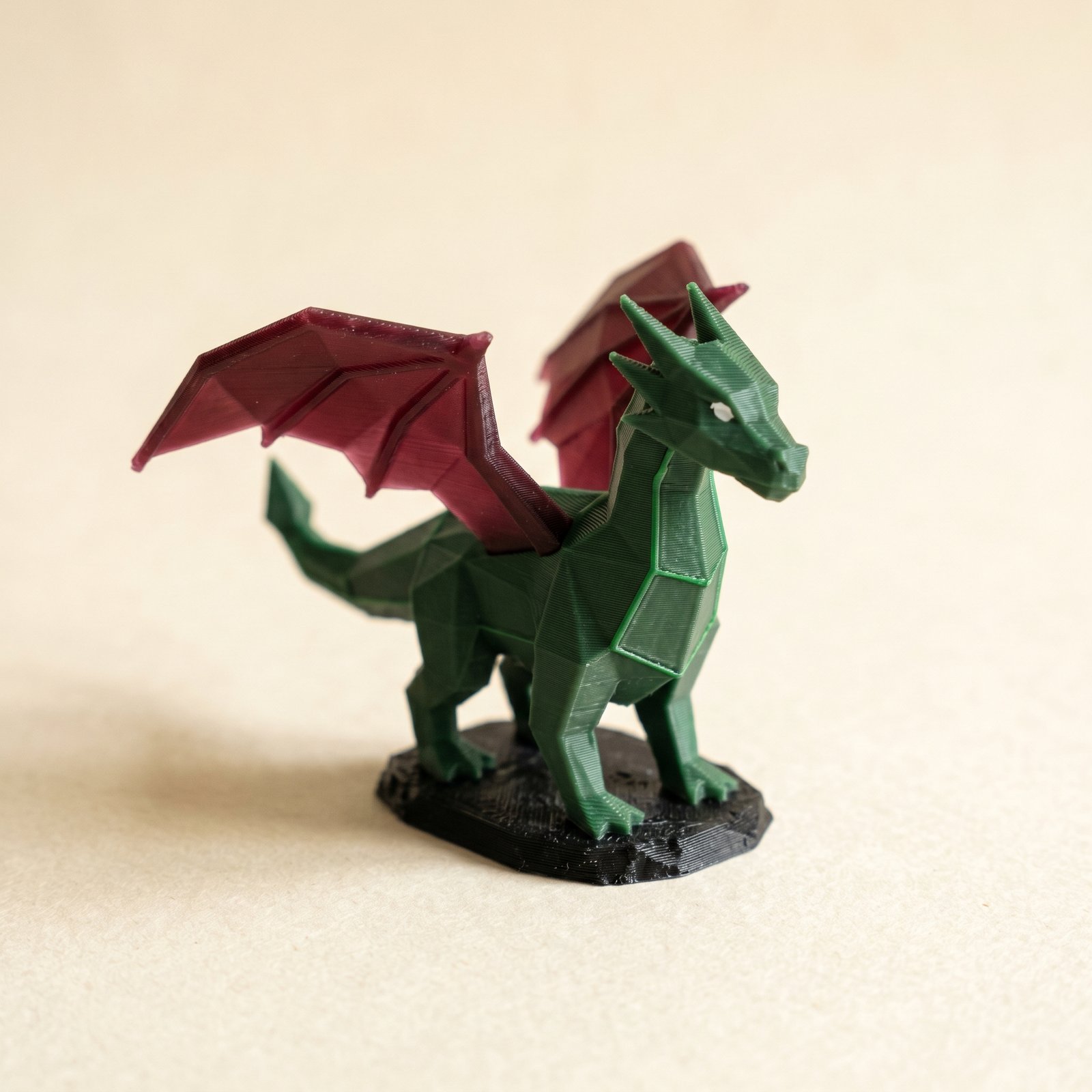 A multi-colored 3D printed miniature painted with Layerpaint, showing per-region filament assignment